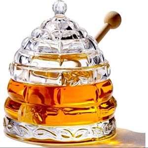 Glass honey jar.